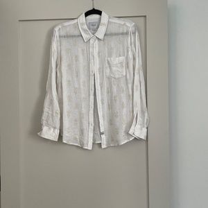 White linen button-down shirt with gold pineapple design